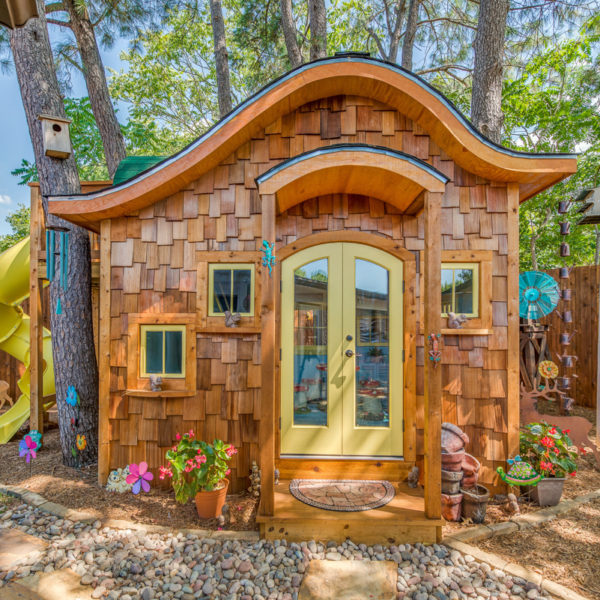 Custom hobbit house playhouse made by Wish To Play 

www.wishtoplay.com